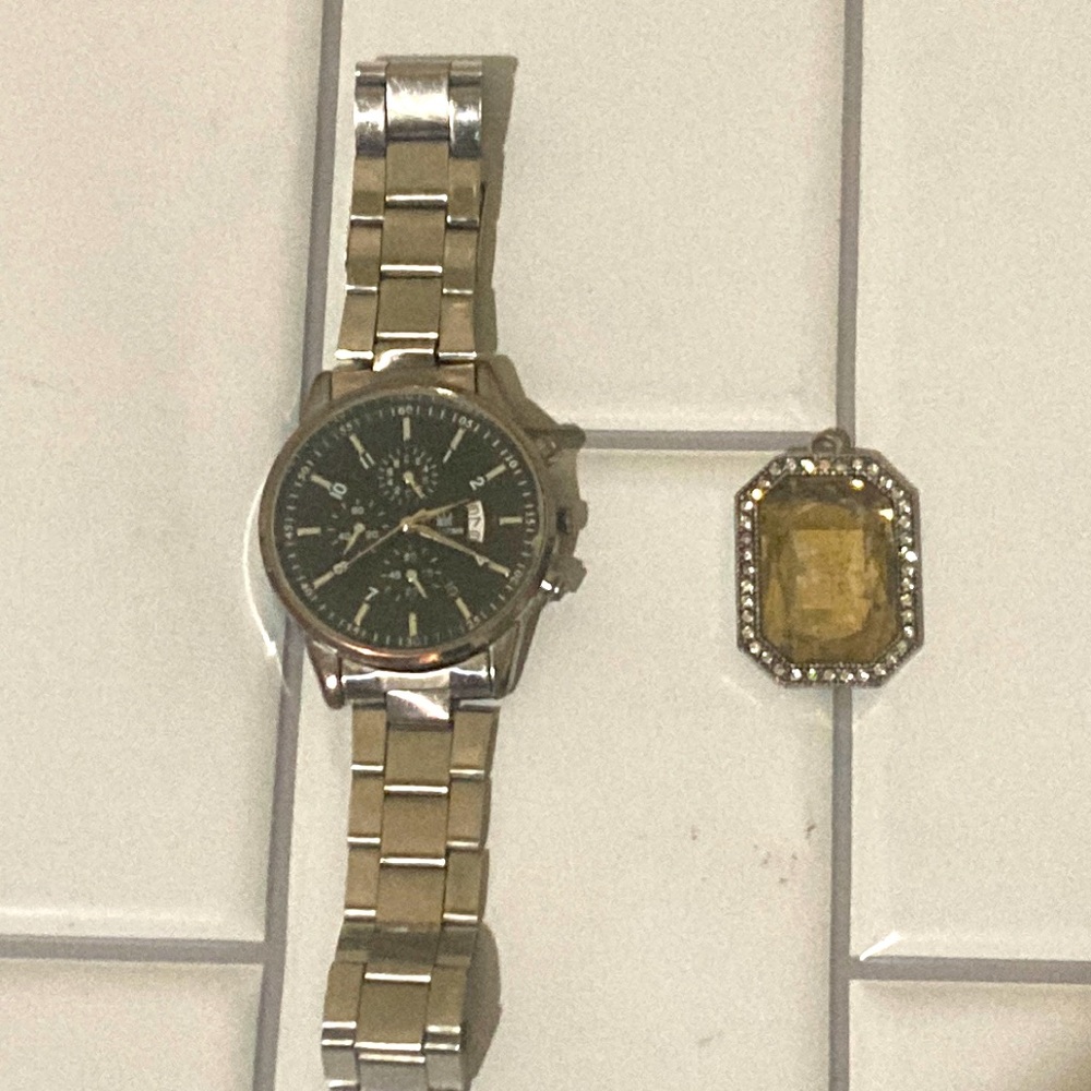 Watch and rhinestone pendant